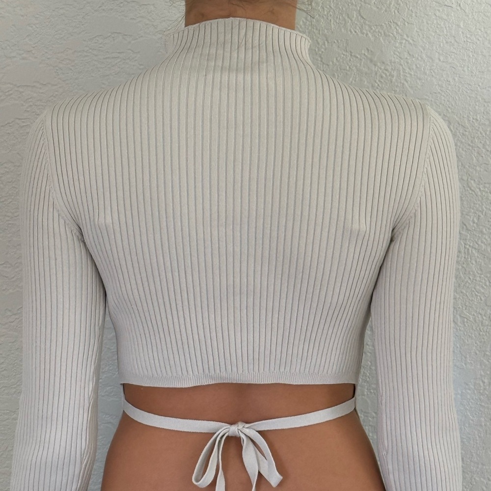 Aritzia babaton mock neck sweater with an open back and tie up detail